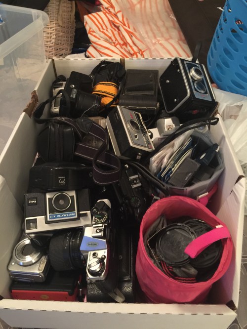 I sorted through remaining wedding decor. This box is waiting to be displayed on a wall of shelves 